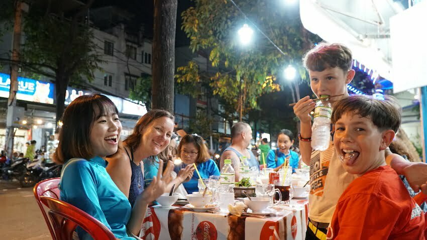 family friendly tour in vietnam scooter moped bike tour ho chi minh city food after dark vespa adventures back of the bikes street food tour traveling with family 