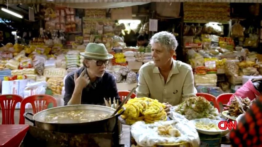 anthony bourdain loves vietnam scooter moped bike tour ho chi minh city food after dark vespa adventures back of the bikes street food tour 